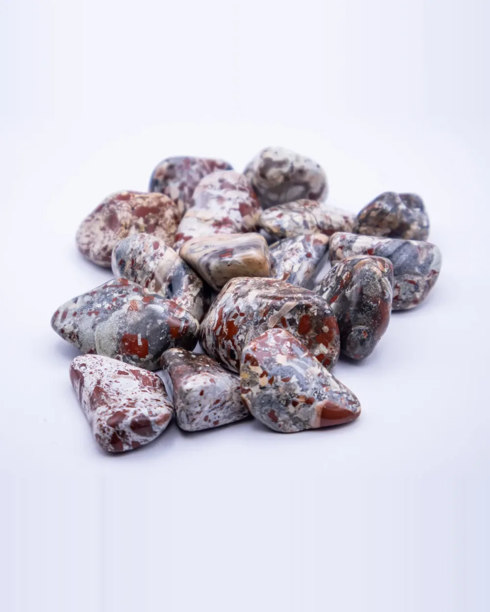 Brecciated Jasper tumbled stone, a group of polished stones